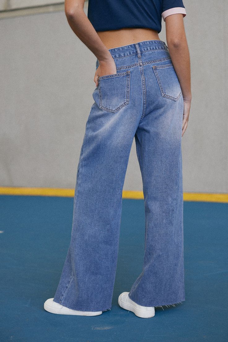 Edgy meets classic. The Denim Raw Cut Wide Leg Jeans feature a unique seam detail down the center of each leg and a trendy raw cut hem. Perfect for adding a touch of boldness to your everyday denim look. Product code: CAA02B4G033TT Features:  Woven Seam detail Wide leg Raw-cut hem Wash Method: Regular Wash Material: 71%COTTON,29%POLYESTER. High Rise Denim Jeans With Frayed Hem, Dark Wash High Rise Jeans With Frayed Hem, Dark Wash Denim Flare Jeans With Frayed Hem, Trendy Cropped Leg Denim Flare Jeans, Streetwear Medium Wash Flare Jeans With Frayed Hem, Streetwear Frayed Hem Flare Jeans In Medium Wash, Washed Blue Straight Leg Jeans With Frayed Hem, High Waist Medium Wash Jeans With Frayed Hem, Medium Wash Rigid Denim Jeans With Frayed Hem