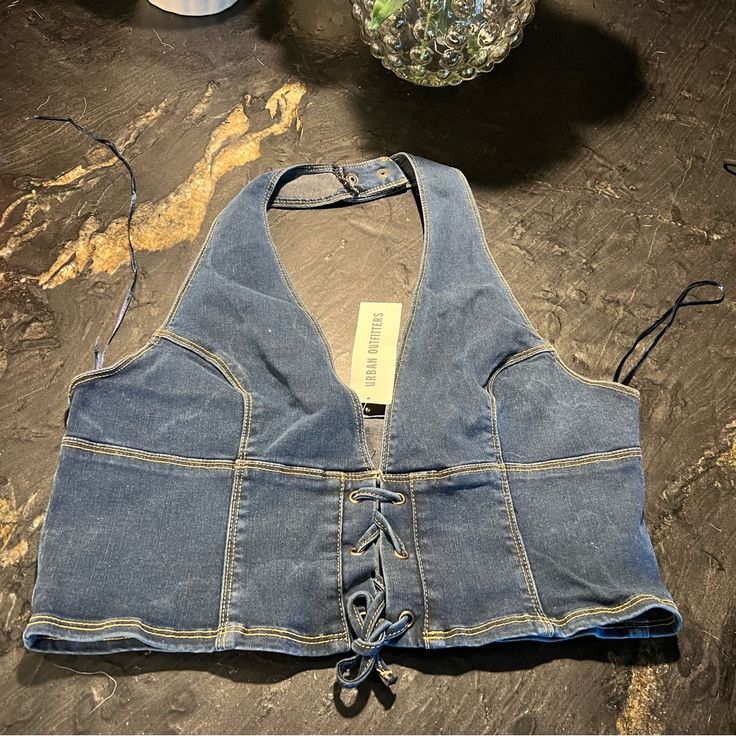 Urban Outfitters New With Tags Denim Crop Top Lease Up Casual Dark Wash Crop Top For Spring, Spring Denim Blue Denim Crop Top, Trendy Denim Blue Crop Top, Blue Denim Crop Top For Spring, Spring Medium Wash Jeans By Urban Outfitters, Urban Outfitters Fitted Blue Jeans, Light Wash Denim Casual Crop Top, Urban Outfitters Medium Wash Jeans For Spring, Trendy Spring Jeans By Urban Outfitters