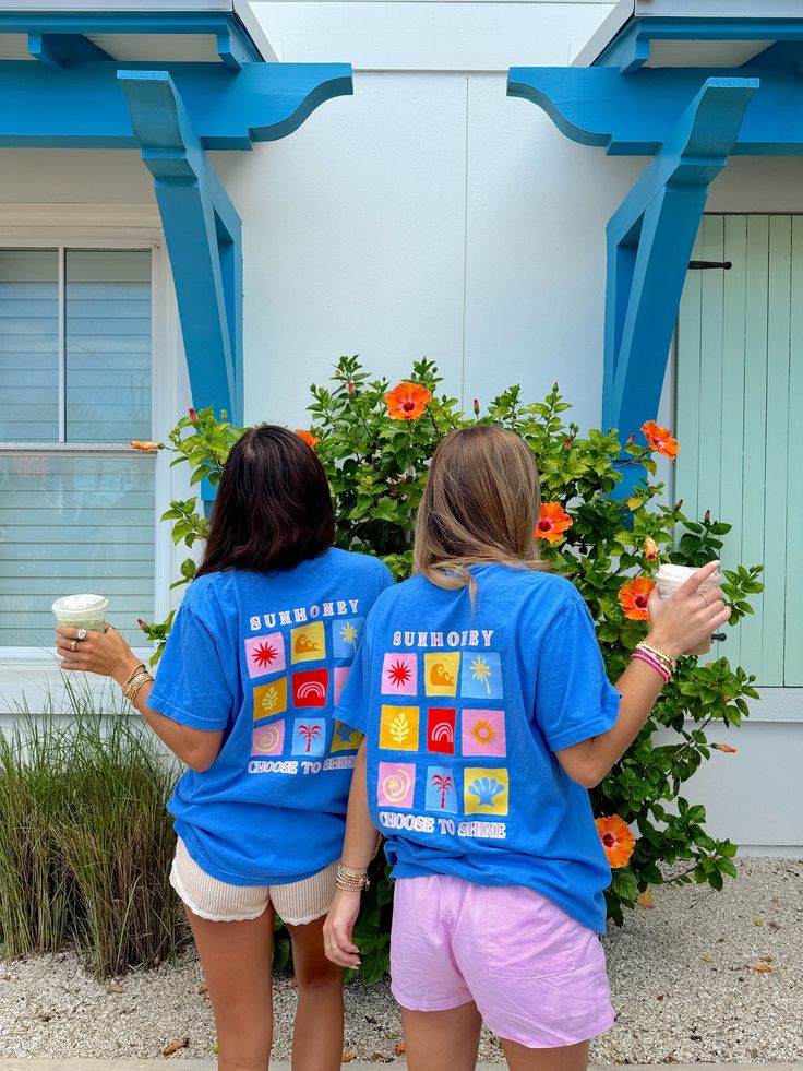 Our *EXCLUSIVE* Sunhoney Daydream T-shirt in Ocean Blue is giving all the Sunhoney vibes!! This designed was designed by us and only available through us!! This design features our favorite summer time icons in playful color combinations. This design is printed on Comfort Colors t-shirt so you know it's going to be super comfy! Style this sweatshirt with your fave boxer shorts, denim or leggings all year round! Product is made to order: available for pick up/ships in 2-4 business days Designed b Blue Graphic Print Tops For Summer Adventures, Blue Tops With Letter Print For Summer Adventures, Cute Multicolor T-shirt For Vacation, Playful Short Sleeve Tops For Summer Adventures, Blue Cotton Tops For Summer Adventures, Cute Graphic Print T-shirt For Summer, Playful Short Sleeve Tops For Beach Season, Fun Summer Printed T-shirt, Blue Relaxed Fit Top For Summer