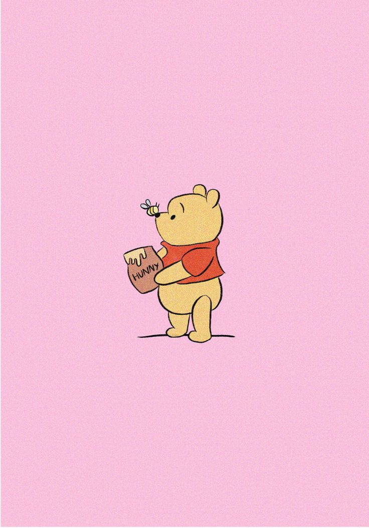 winnie the pooh holding a piece of cake