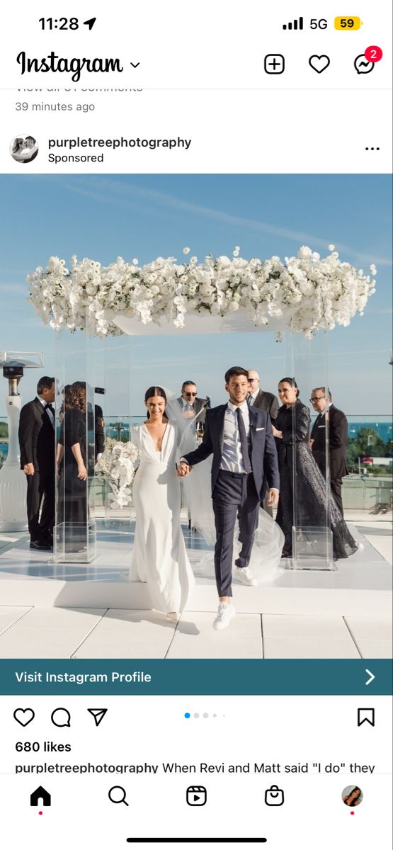 the instagram page on instagram shows an image of a bride and groom walking down the aisle