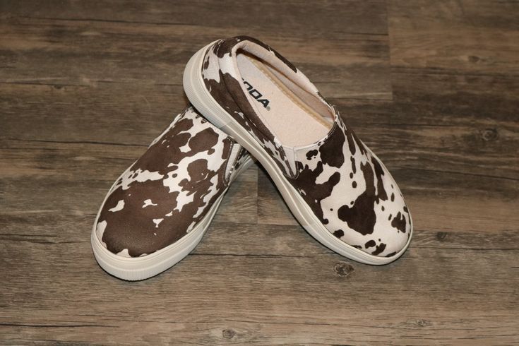 These western cow print shoes are a greatt accesssorie for every outfit. They are slip-ons and very comfortable!! Cow Print Shoes, Statement Shoe, Print Shoes, Shoe Print, Slide On, Cow Print, Slip Ons, Cute Shoes, Womens Flip Flop