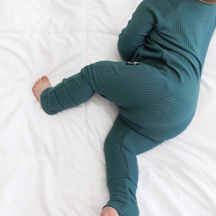 Introducing our Ribbed Zip Romper, crafted from breathable, silky smooth 95% Bamboo Viscose and 5% Spandex in custom prints. This long sleeve romper combines style, comfort, and convenience, making it a must-have for your little one's wardrobe. Key Features: Breathable & Silky Smooth: Made from 95% Bamboo Viscose and 5% Spandex, our fabric is incredibly soft and feels as luxurious as cashmere, ensuring all-day comfort. Double Zip Design: Features a double zip for easy diaper changes, providing b Newborn Beanie, Female Owned Business, Oversized Blanket, Bamboo Pajamas, Zip Design, Twirl Dress, Skirt Jumpsuit, Bubble Romper, Jogger Shorts