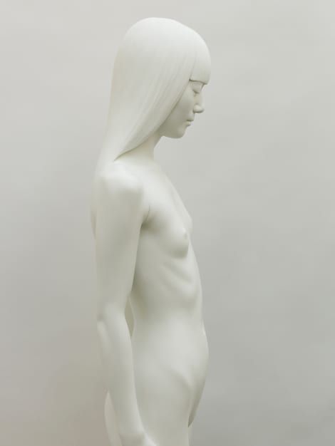 a white female mannequin with long hair