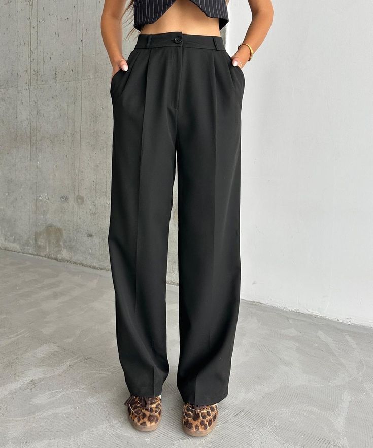 Introducing our Korean Wide Length Pants, perfect for both professional settings and casual wear. These pants feature a high-waisted design and a fluid wide-length silhouette that exemplifies modern elegance and comfort. Features: Material: Made with a smooth, high-quality fabric blend that offers both comfort and durability. Special Features: These pant come with a sleek, button closure and deep pockets for functionality without compromising style. Technical Specifications: Tailored to maintain Taper Design, Warm Pants, Comfy Pants, Bell Bottom Pants, Office Wear, Modern Elegance, Bell Bottoms, Special Features, Black Pants