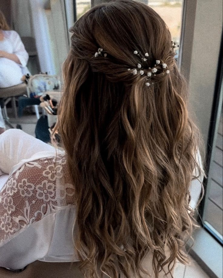 Boho bride hairstyle with flowers Bride Hair With Flowers, Bridesmaid Hair With Flowers, Boho Bride Hairstyles, Bridal Hair With Flowers, Half Updo Wedding, Bridal Half Updo, Wedding Hair With Flowers, Boho Wedding Hair Flowers, Hairstyle With Flowers