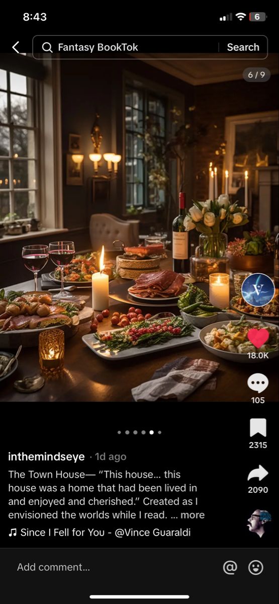 a table full of food with candles on it