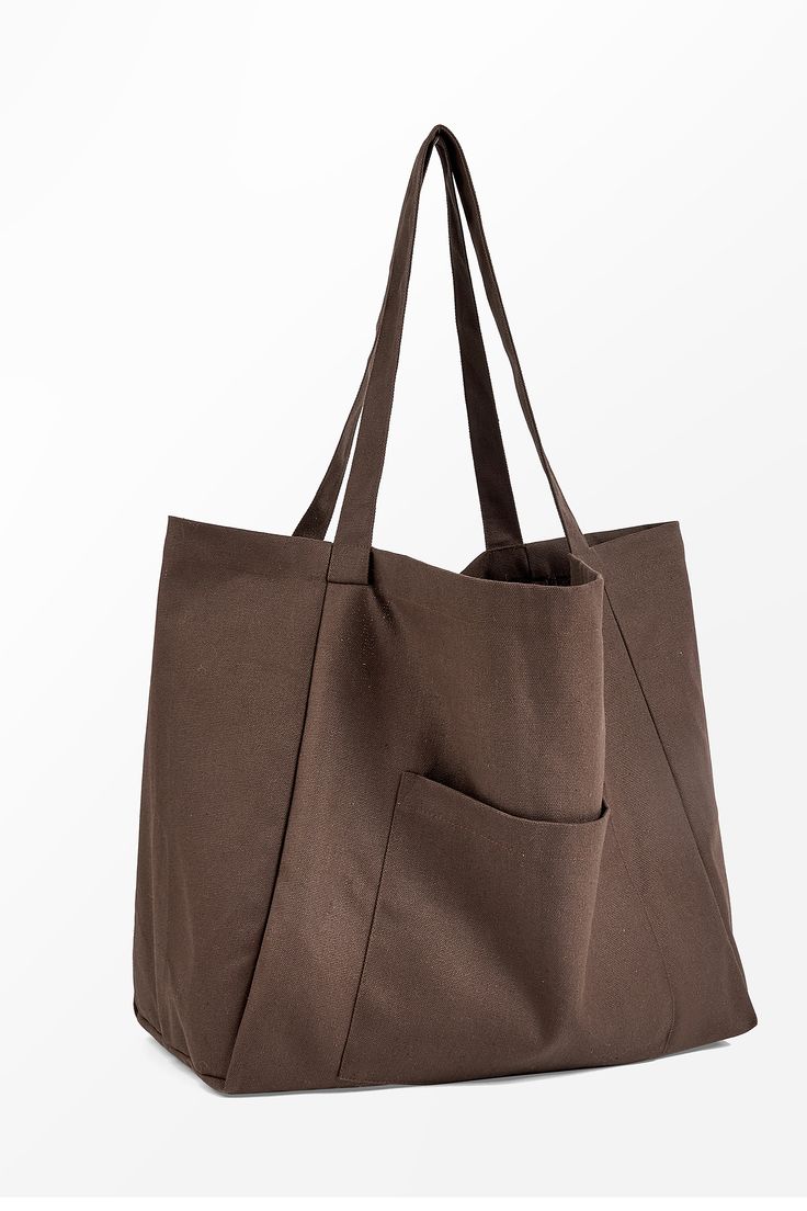 Carry your essentials in style with our Coffee Brown Woven Tote. This spacious and durable tote features a rich coffee brown hue and a classic woven design, making it perfect for everyday use or beach outings. Product code: CAC12F4H006HH Features:  Material: 100%POLYESTER.