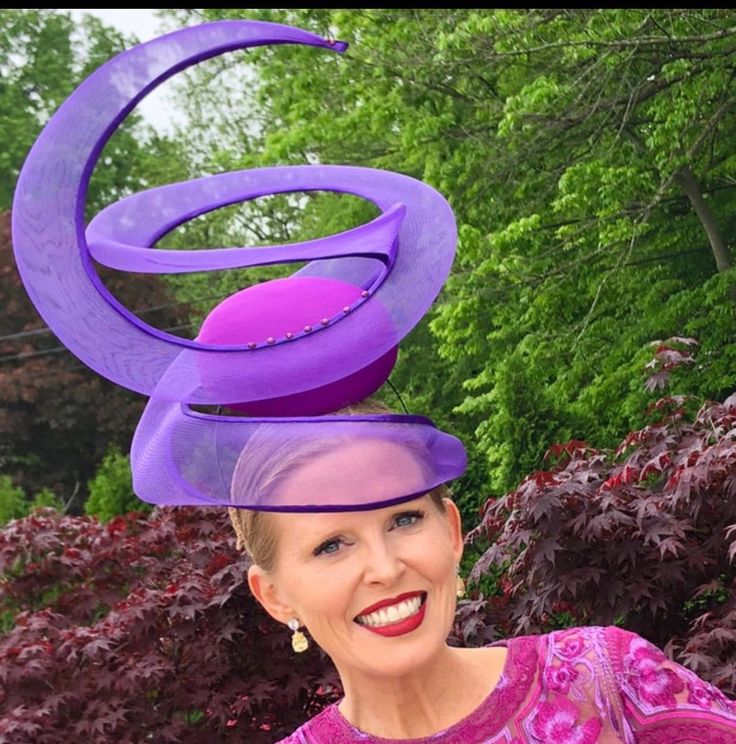 Hat Title : The Twist (in Violet)  *Can also be made in other colours. Enquire if you'd want a colour different than the photos.                           This hat was especially made for the Royal Ascot Pop Up Shop in Kensington London  The Twist is an elegant headwear sculpture featuring a front facing round button base and a structured veil that start from the side of the face, over the face, and spirals upwards creating a perception of height and drama.  This haute couture headpiece is perfe Crinoline Fascinator, British Hats, Kentucky Derby Fascinator, Royal Ascot Hats, Occasion Hats, Derby Fascinator, Couture Hats, Ascot Hats, Kensington London