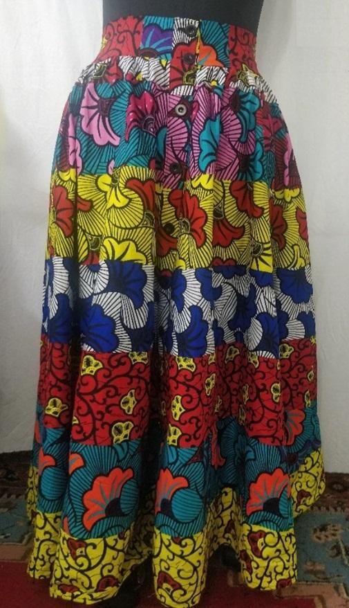 African Print Button Down Maxi Skirt Colors: Black/White, Blue/Gold, Geometric, Orange/Multi, Multi, Pink/Blue, Red/Yellow, Yellow/Orange Size: One size fit All (up to size 3X) GROUP ORDERS AVAILABLE Button Down Maxi Skirt, Patchwork Skirts, African Skirt, Ankara Skirts, Diy Denim Jacket, African Print Skirt, African Skirts, Colorful Skirts, Box Pleat Skirt