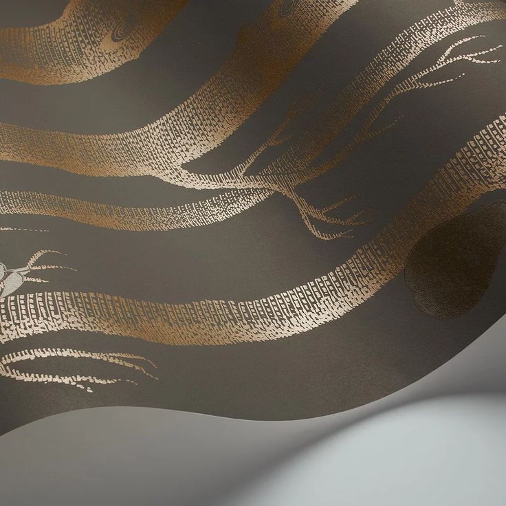 an abstract gold and black wallpaper design