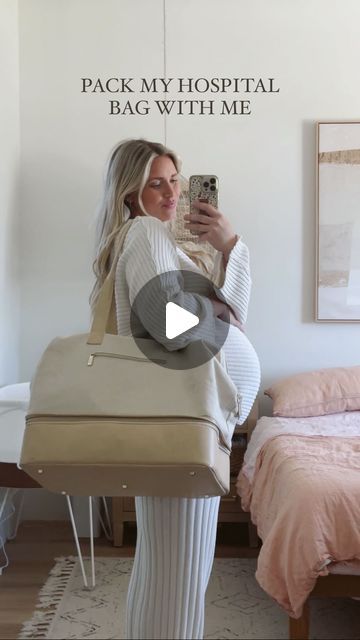 a woman taking a selfie in her bedroom