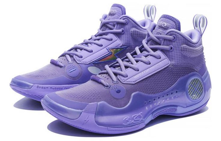 a pair of purple sneakers on a white background