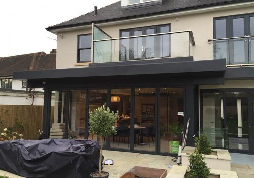 an outside view of a house with a covered patio