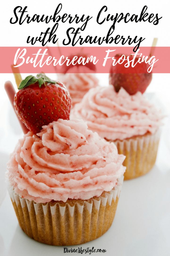 strawberry cupcakes with strawberry buttercream frosting and strawberries on top