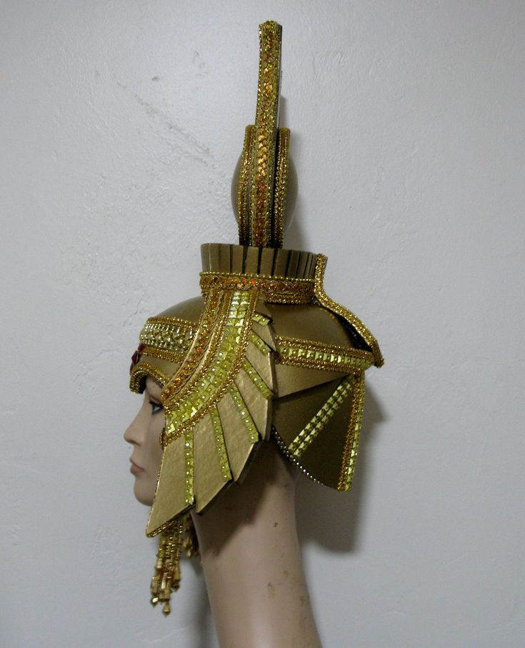 "Cleopatra Gold and Red Headdress, it is made in Strong Eva foam, so light weight, but strong. Decorate with metallic gold trims, jewels, rhinestones trims, beads, fringe gold beads, sequins trim, gold paint and same glitter. The headdress is lining with felt and have adjustable elastic on the back. Fit well until 23\" inches circumference. Please send me your head circumference measurements. Any question let me know. Thank you" Gold Costume Hats And Headpieces For Carnival, Fitted Gold Costume Hat For Carnival, Fitted Gold Carnival Costume Hat, Traditional Gold Costume Hats For Party, Gold Mardi Gras Costume Hats And Headpieces, Gold Fantasy Headpiece For Carnival, Gold Fantasy Costume Hats And Headpieces, Gold Headpieces For Costume Party And Carnival, Fitted Gold Costume For Costume Party