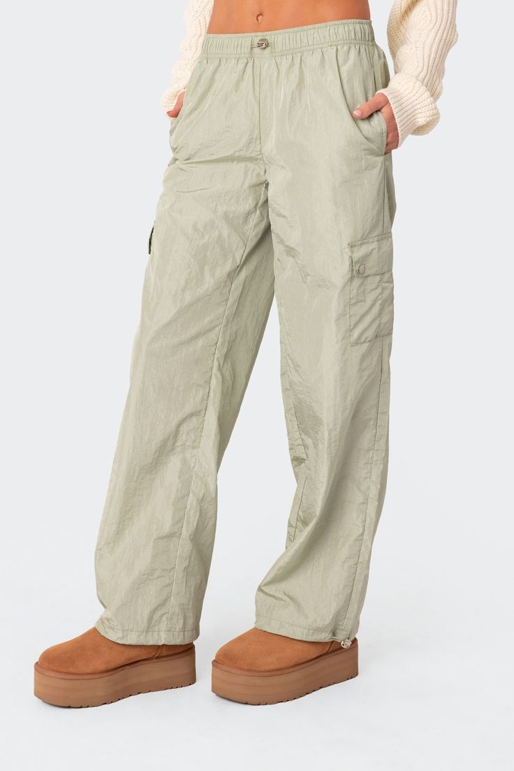 Cargo pants Low rise Elastic waist Military style pockets Nylon fabric Polyester Model wears size S Model height is 5'9 Item care: Wash with similar color Cargo Pants Low Rise, Nylon Cargo Pants, Pants Low Rise, Gilly Hicks, Swimwear Dress, Military Style, Nylon Fabric, Military Fashion, Hottest Trends