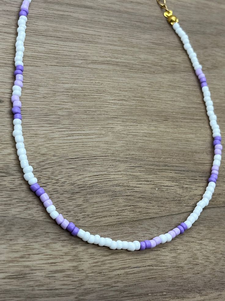 This is one of our shop's signature necklaces! I hope you love this as much as I do! Purple Beaded Necklace With Letter Beads As Gift, Trendy White Single Strand Beaded Necklace, Casual Colorful Beaded Necklaces For Everyday, Trendy White Heishi Bead Necklaces, Casual Beaded Necklace With Tiny Beads, Trendy Purple Round Bead Necklaces, Casual Beaded Necklaces With Tiny Beads For Everyday, Trendy White Heishi Beads Necklace, Trendy Purple Jewelry With Tiny Beads