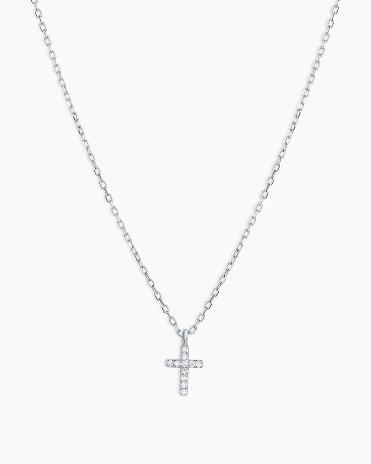 This understated diamond cross necklace can beautifully add to any outfit with its subtle shimmer. To enhance your look, layer your dainty diamond necklace with other chains or add a pop of color with a strand of beautiful gemstones. Diamond Cross Necklace in 14k Solid White Gold, Women's by gorjana Elegant White Gold Cross Necklace With Adjustable Chain, Elegant Cable Chain Jewelry With Cross Pendant, Elegant Cable Chain Cross Pendant Jewelry, Elegant Crucifix Jewelry With Delicate Chain, Elegant Sterling Silver Cross Necklace With Adjustable Chain, Elegant Sterling Silver Cross Necklace With Delicate Chain, Elegant Cross Necklace With Delicate Chain, Dainty Cross Necklace In Cubic Zirconia, Dainty Cubic Zirconia Cross Necklace