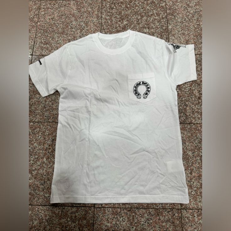 Questions? Leave A Comment Below! White Cotton Shirt With Graphic Print, White Logo Print Graphic Tee, White Short Sleeve Shirt For Streetwear, White Cotton Shirt With Logo Print, Chrome Hearts T Shirt, Chrome Hearts Sweatshirt, Chrome Hearts Tank Top, Chrome Hearts Zip Up, Chrome Hearts Tee Shirt