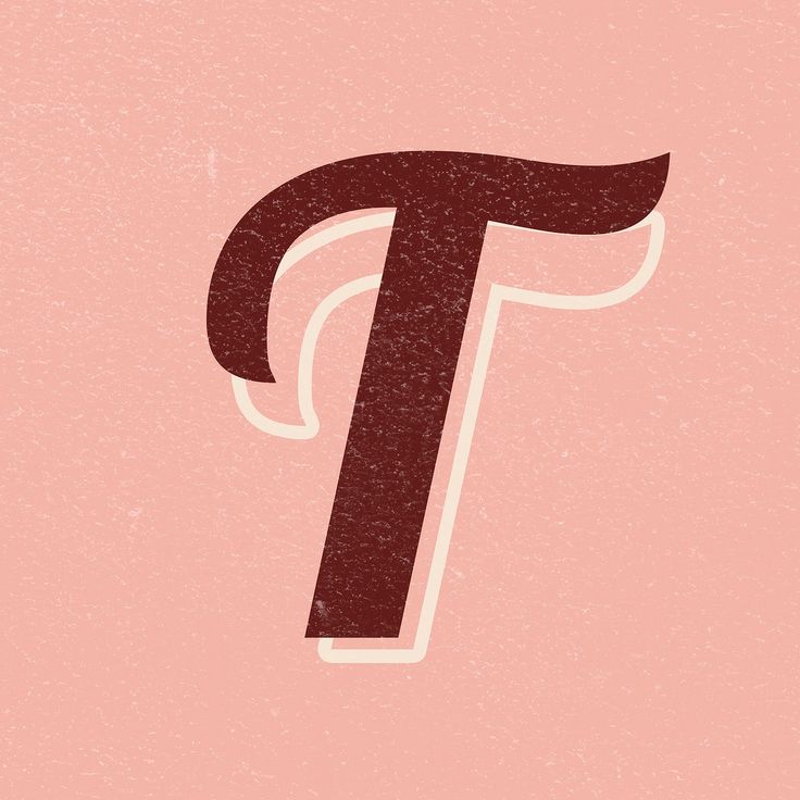 the letter t is made up of brown and white letters on a pink background,