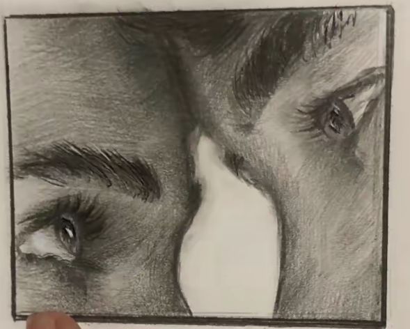 a drawing of two people's faces with their noses close to each other, in front of a white wall