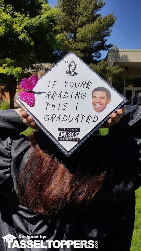 a graduate holds up his cap with the words, if your reading this i graduated