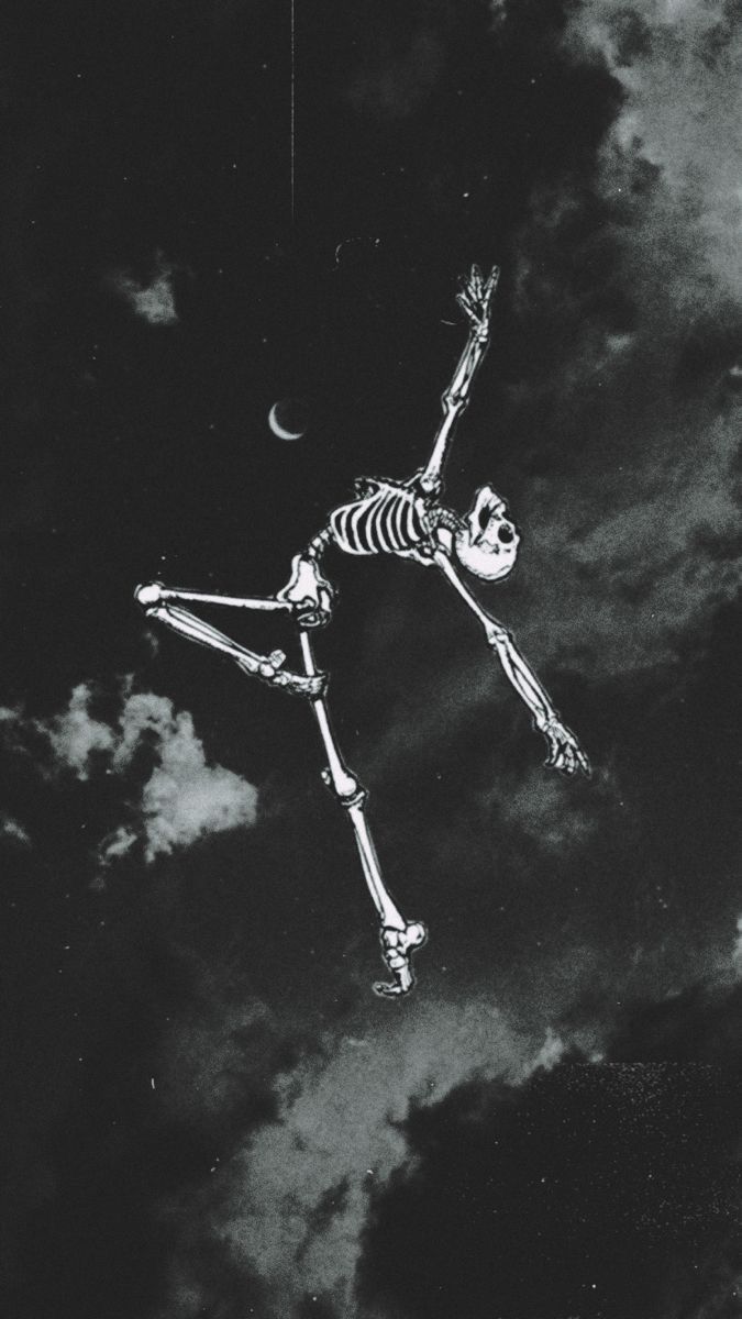 a skeleton is flying through the air in front of some dark clouds and half moon