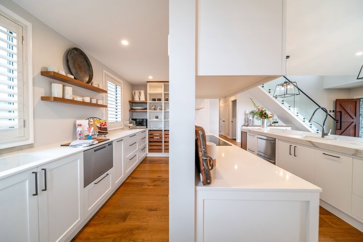 the kitchen is clean and ready to be used as a dining room or office area