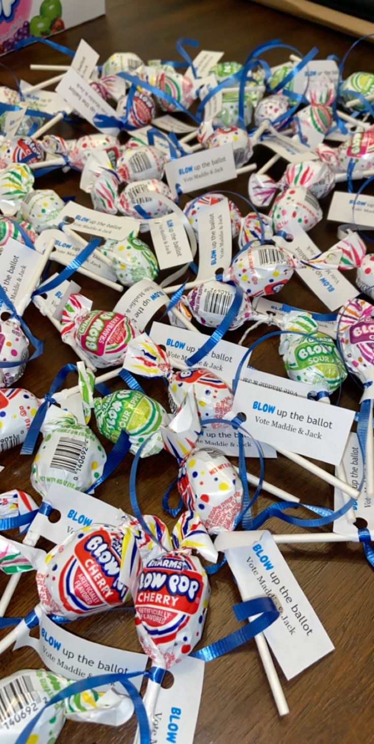 many lollipops are tied together on the table