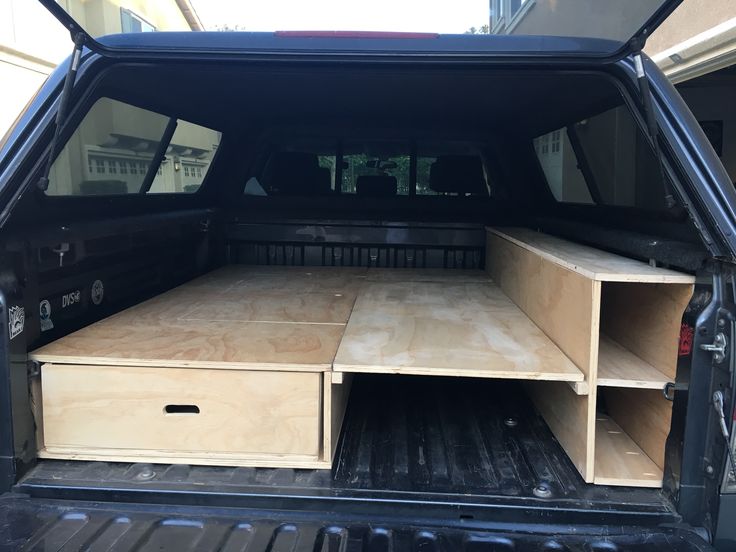 the back end of a truck with drawers in it