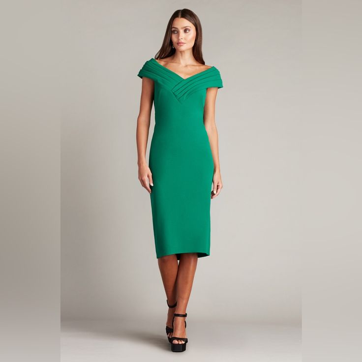 This Textured Crepe Gown Pairs Graphic Appeal With Elegant Ease. It Has A Draped V-Neckline And Cap Sleeves Accentuated By Contrast Blocking. Color: Bamboo Fitted Green V-neck Evening Dress, Fitted Green V-neck Dress For Evening, Elegant Green V-neck Mini Dress, Fitted V-neck Green Dress, Spring Formal Dress With Open Neckline, Formal Spring Dress With Open Neckline, Elegant Gala Dress With Open Neckline, Green V-neck Midi Dress For Gala, Formal Green Fitted V-neck Dress