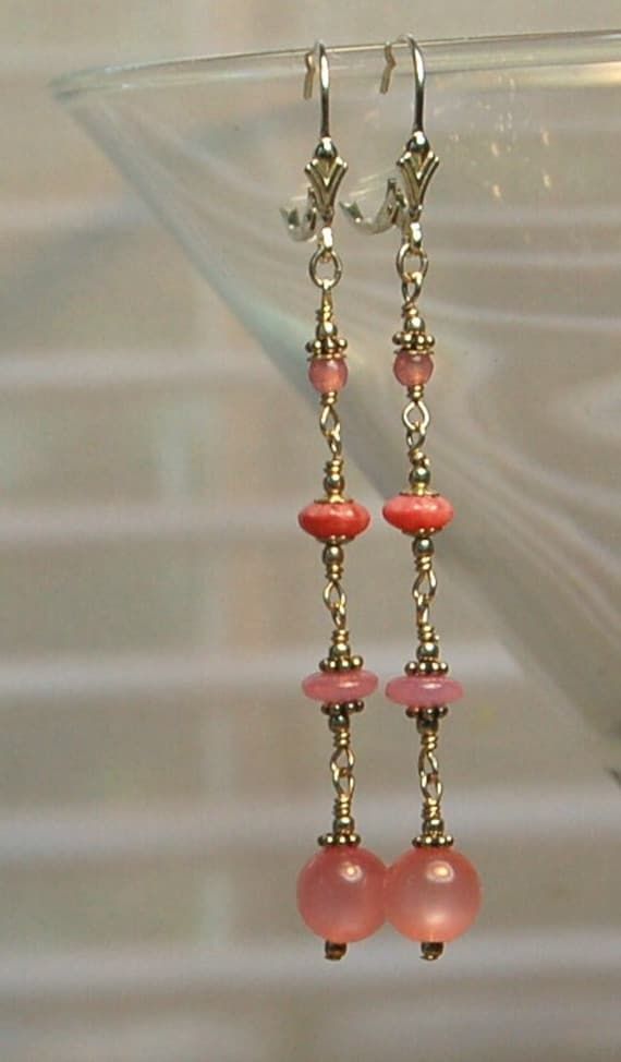 Different shaped pink Czech glass and Bali sterling silver beads are featured in these earrings. All metal is 925 sterling silver. Each earrings weighs 1.5 grams compared to a US dime weighing 2.268 grams. Size and length can be determined in the photo above as compared to a ruler and a US dime. If you are interested in these earrings and would like more photos or have any questions please feel free to contact me. I usually answer all inquiries the same day within the hour Eastern Standard time. Pink Dangle Clip-on Jewelry, Pink Clip-on Dangle Jewelry, Elegant Pink Dangling Beads Earrings, Pink Dainty Sterling Silver Earrings, Dainty Pink Sterling Silver Earrings, Pink Sterling Silver Round Bead Earrings, Pink Dangle Linear Earrings For Pierced Ears, Adjustable Pink Sterling Silver Beaded Earrings, Nickel Free Pink Drop Clip-on Earrings