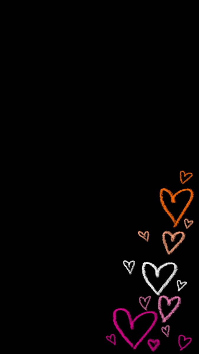 a black background with hearts drawn on it