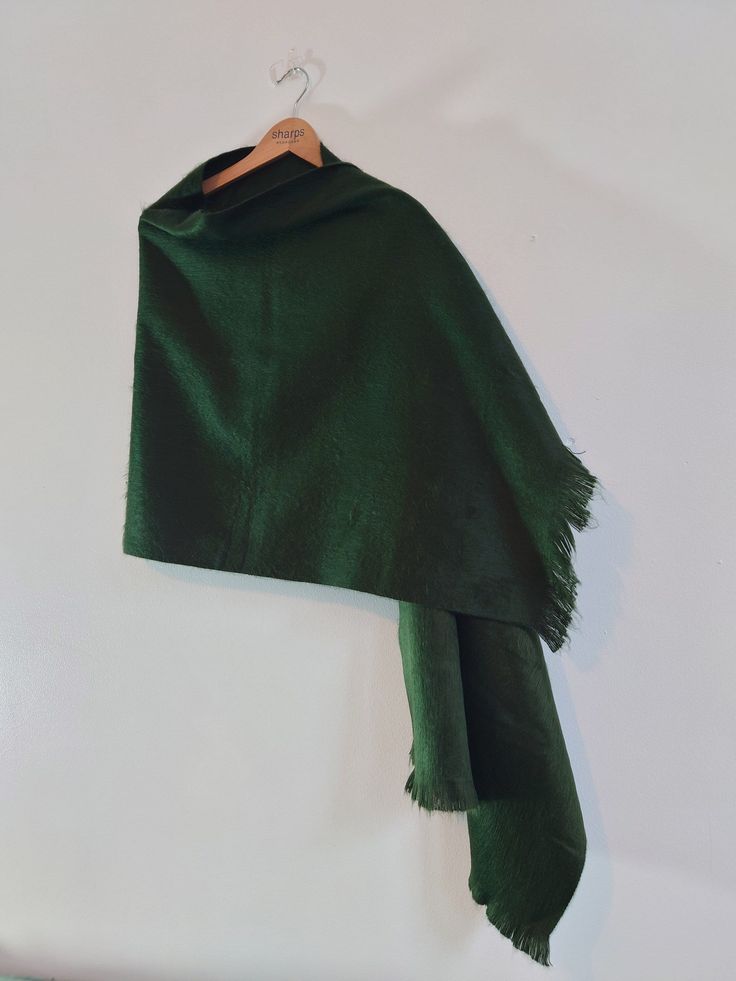 Alpaca Shawl Green Scarf Thin Wool Scarf Emerald Shawl Bridesmaid Shawl Luxury Scarf/ Jade Shawl Gifts for her Beautiful wedding shawl. Green Alpaca shawl with hints of jade and olive undertones. *About this item: Military Green Shawl This luxurious scarf is soft and has a natural sheen. This green shawl is excellent for daily use, you can wear it with a coat, jeans as well as a fancy dress. It's very versatile. This beautiful military green/ olive green shawl is perfect for the wedy season as w Shawl Luxury, Green Shawl, Coat Jeans, Alpaca Shawl, Luxury Scarf, Bridesmaid Shawl, Olive Undertones, Scarf Wool, Handmade Scarf