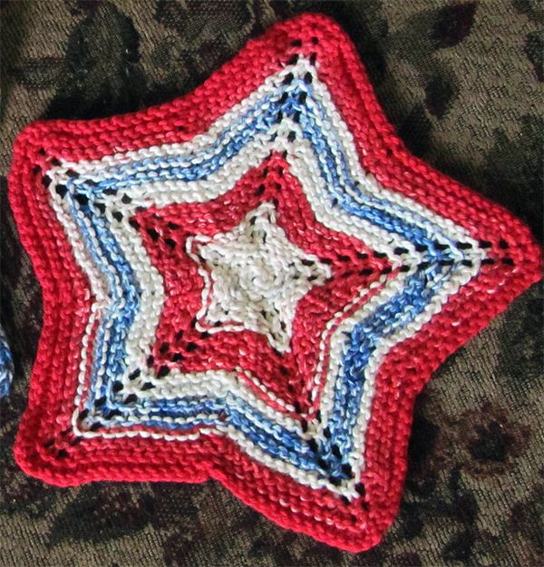 a crocheted red, white and blue star