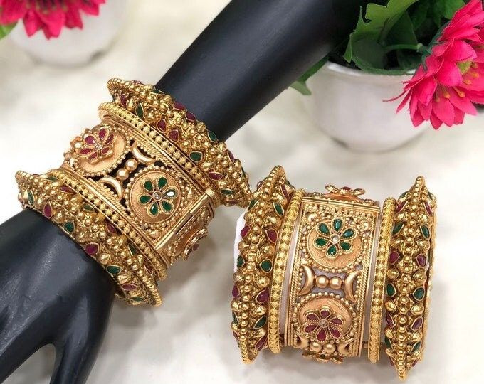 Traditional Gold plated Chuda Bangles Set/ Kundan Work Chuda/ Wedding Chura Rajwada Wedding Chura / Dulhan Bangles Set/ traditional Bangles Size 2.6 and 2.8 All products are handmade and manufactured using traditional skills so any variations are a part of these processes. Please note that while we have tried to accurately display the colours of the products, the actual colours you see will depend on your screen, which may not be accurate. Make every occasion special This wedding season shop our Dulhan Bangles Set, Wedding Chura, Traditional Bangles, Couple Ring Design, Colorful Bangles, Kundan Work, Perhiasan India, Lehenga Designs Simple, Traditional Indian Jewellery