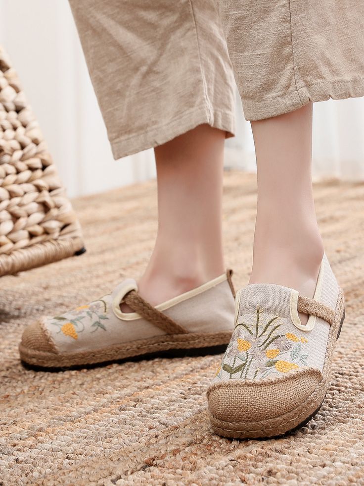 Radiate beachy vibes with every step wearing this slip-on espadrille that showcases a stripe motif and cross-strap. A rubber sole keeps your footing sure as you navigate slippery terrain. Slip-on Canvas linen upper Man-made lining Natural straw mat breathable insole Rubber sole Summer Closed Toe Espadrilles, Beige Flats With Woven Sole For Spring, Beige Round Toe Espadrilles For Beach Season, Spring Bohemian Flats With Round Toe, Bohemian Spring Flats With Round Toe, Spring Beige Slip-on Flats, Bohemian Round Toe Flats For Spring, Beige Slip-on Flats For Spring, Trendy Closed Toe Espadrilles For Beach Season