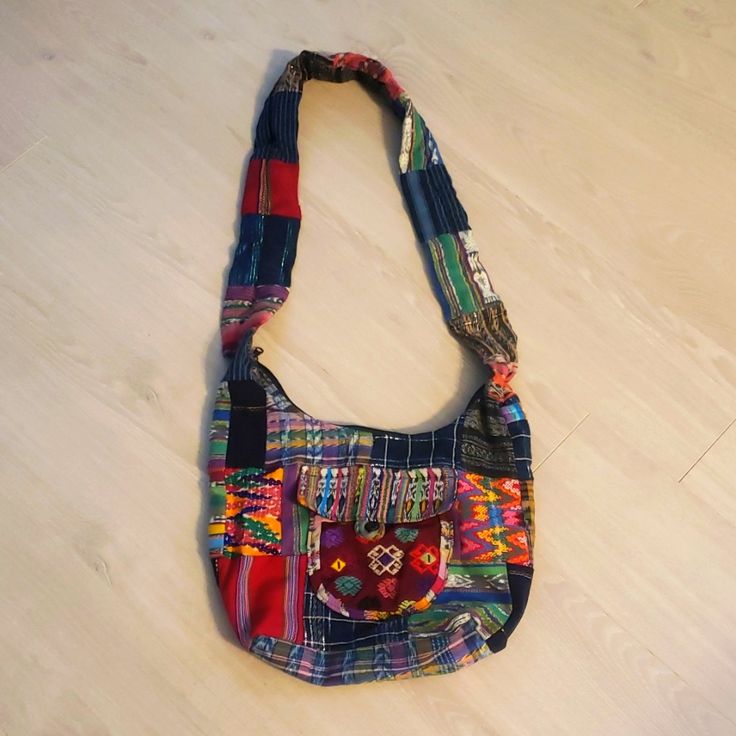 Multicolored Cotton Bag Casual Multicolor Patchwork Hobo Bag, Multicolor Cotton Bag With Pockets, Multicolor Cotton Bags With Pockets, Multicolor Shoulder Bag With Pockets, Bohemian Multicolor Bags With Pockets, Casual Multicolor Hobo Bag For Festivals, Casual Blue Patchwork Bag, Blue Cotton Hobo Shoulder Bag, Multicolor Shoulder Bag With Pockets For Daily Use