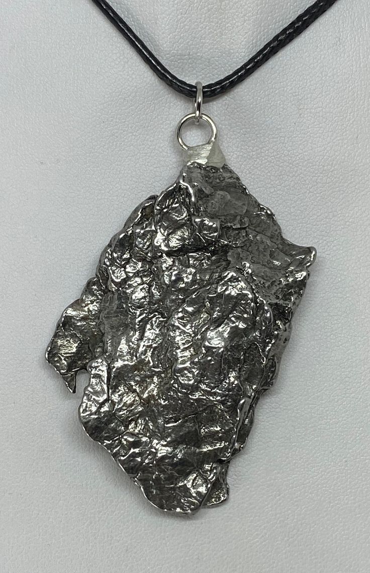 Excited to share this item from my #etsy shop: Large Rare Meteorite Campo del Cielo Pendant 58.22 grams, Front and Back smooth, Beautiful formation, Astronomy Gift, A great Gift Meteorite Pendant, Iron Meteorite, Astronomy Gift, New Space, How Many People, Space Age, Leather Necklace, Snake Chain, Astronomy