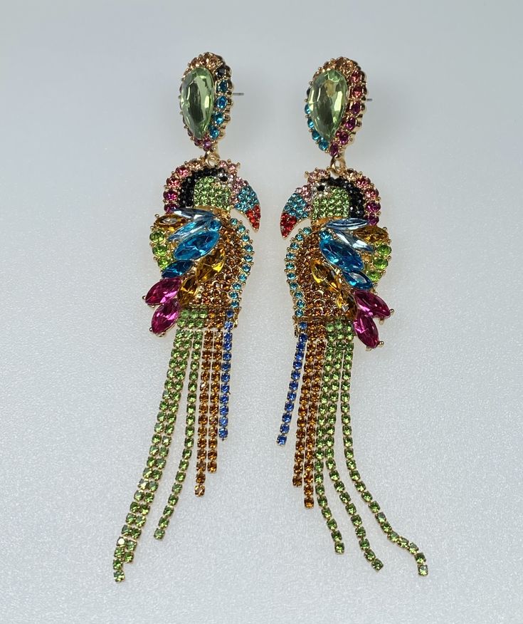 These 5" long earrings are definitely exquisite. Multicolored and sparkling, these earrings will provide sassiness to your outfits! Full of attitude, these earrings are for the confident woman in you! Make these earrings part of your collection today! Confident Woman, Gorgeous Jewelry, Rhinestone Earrings, Long Earrings, Amazing Jewelry, Fashion Earrings, Turquoise Necklace, Sparkle, Beaded Bracelets