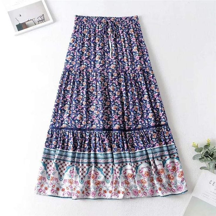 Product Details: Floral print Elasticized mid waistband with hanging tassel ties Wide contrast ruffled hemline Cropped maxi length Fabric: Cotton Long Skirt Casual, Boho Queen, Products Display, Flare Maxi Skirt, Hippie Skirts, Bohemian Skirt, Queen Fashion, Floral Rosa, Cover Beachwear