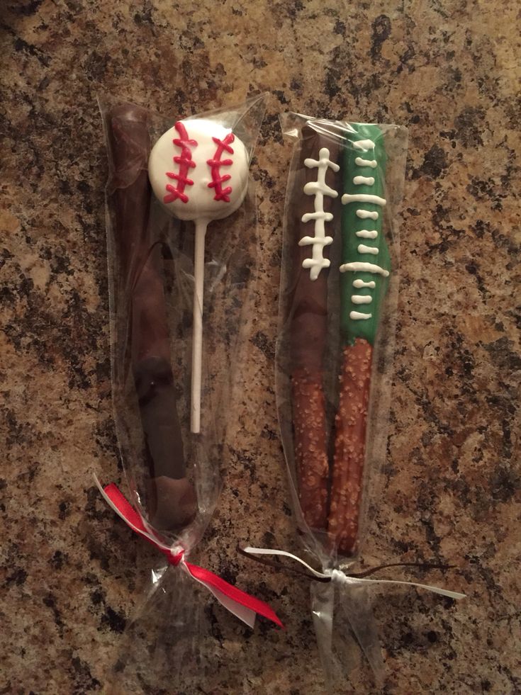 two baseball themed candy sticks wrapped in cellophane