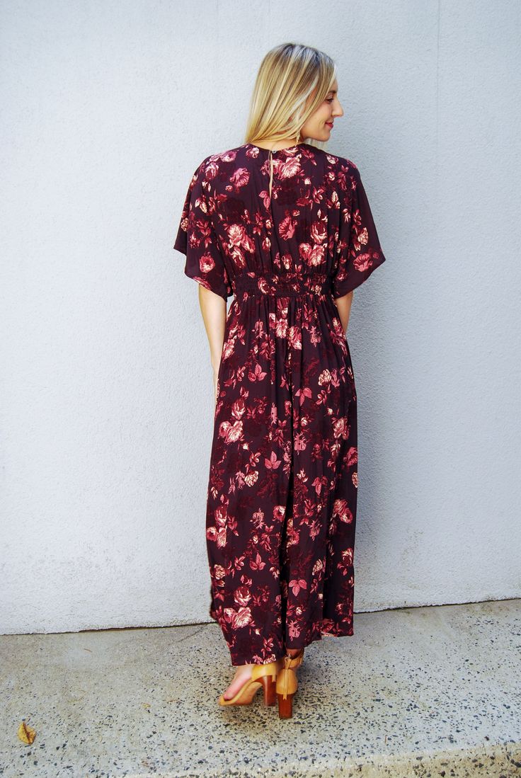 Get ready to fall hard for this playful and stylish midi dress! Featuring a plunging v-neck and beautiful floral print, this dress is designed to make a statement. The front slits and short sleeves add a touch of sass. Bring on the fun with the Falling Hard Midi! Floral Print Short Sleeve V-neck Dress For Day Out, V-neck Rayon Maxi Dress For Garden Party, Floral Midi Maxi Dress For Date Night, Flowy Floral Print V-neck Dress For Day Out, Printed V-neck Rayon Maxi Dress, Floral Print Maxi Midi Dress For Date Night, Floral Print Maxi Length Midi Dress For Date Night, Maxi Length Floral Print Midi Dress For Date Night, Bohemian V-neck Maxi Dress With Side Slits