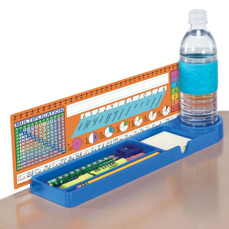 a bottle of water sitting next to a pencil holder