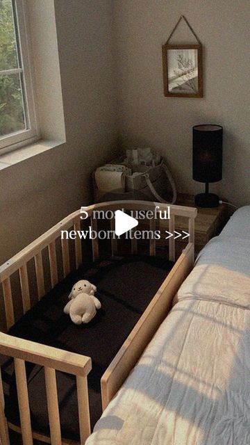 a baby crib with a stuffed animal in it