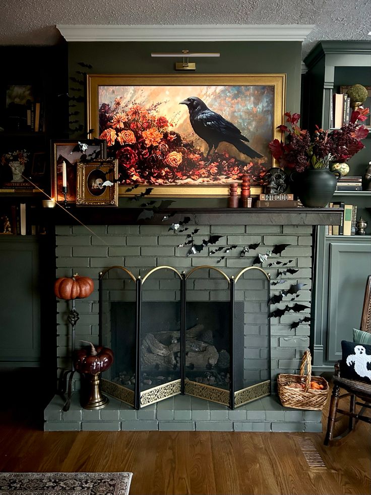 a living room filled with furniture and a fire place covered in halloween decorations on top of a mantle