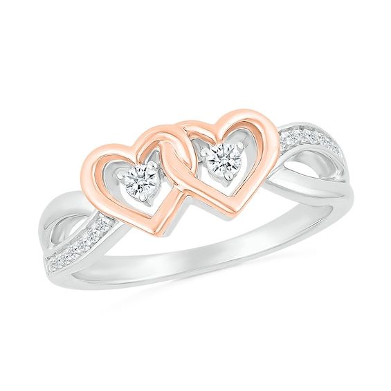 Show how you and your love make a compelling duo with the interlocked design of this diamond heart promise ring. Created in sterling silver and 14K rose gold plate Interlocked heart-shaped outlines in rose gold plate surround the two center diamonds. Diamond-lined and polished ribbons shine in an alternating twist design along the split shank. This promise ring captivates with 1/8 ct. t.w. of diamonds. Rose Gold Heart Ring With Diamond Accents, Heart-shaped Rose Gold Stackable Promise Rings, Rose Gold Heart-shaped Diamond Promise Ring, Heart Promise Rings Zales, Heart Shaped Engagement Rings Zales, Heart Promise Rings, Peoples Jewellers, Split Shank, Diamond Heart