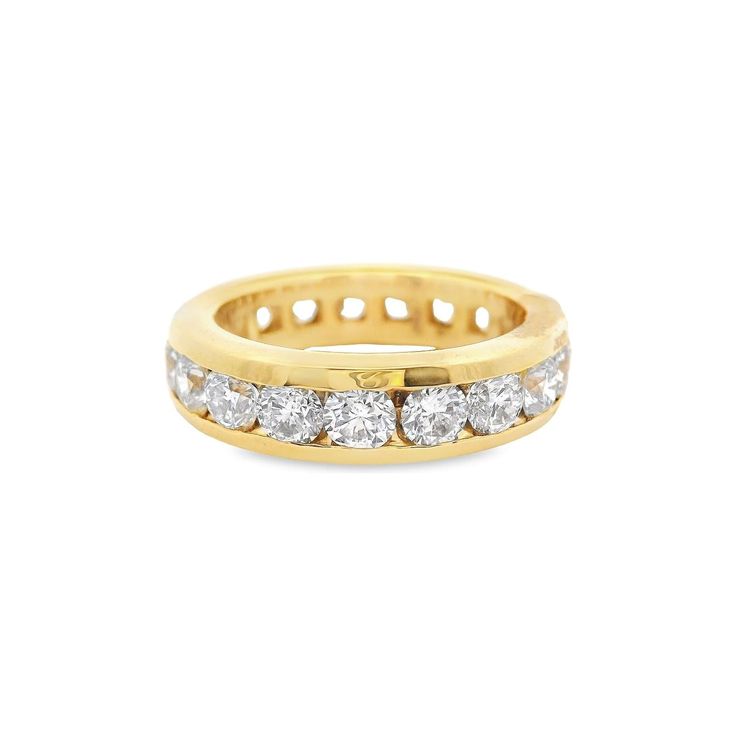 18kt yellow gold 3.4 channel set diamond eternity band. This exquisite piece exudes elegance and sophistication, perfect for adding a touch of luxury to any outfit. Treat yourself to this timeless beauty or surprise a loved one with a gift they'll cherish forever. Shop now and elevate your style to new heights!  Product: Ring Material: Yellow Gold Gemstones: Diamonds Gemstone Carat: 3.05ct Gemstone Shape: Round Rings Mens Wedding Bands, Diamond Eternity Band, Wedding Anniversary Rings, Band Jewelry, Channel Set, Eternity Band Diamond, Diamond Eternity, Eternity Band, Mens Wedding Rings