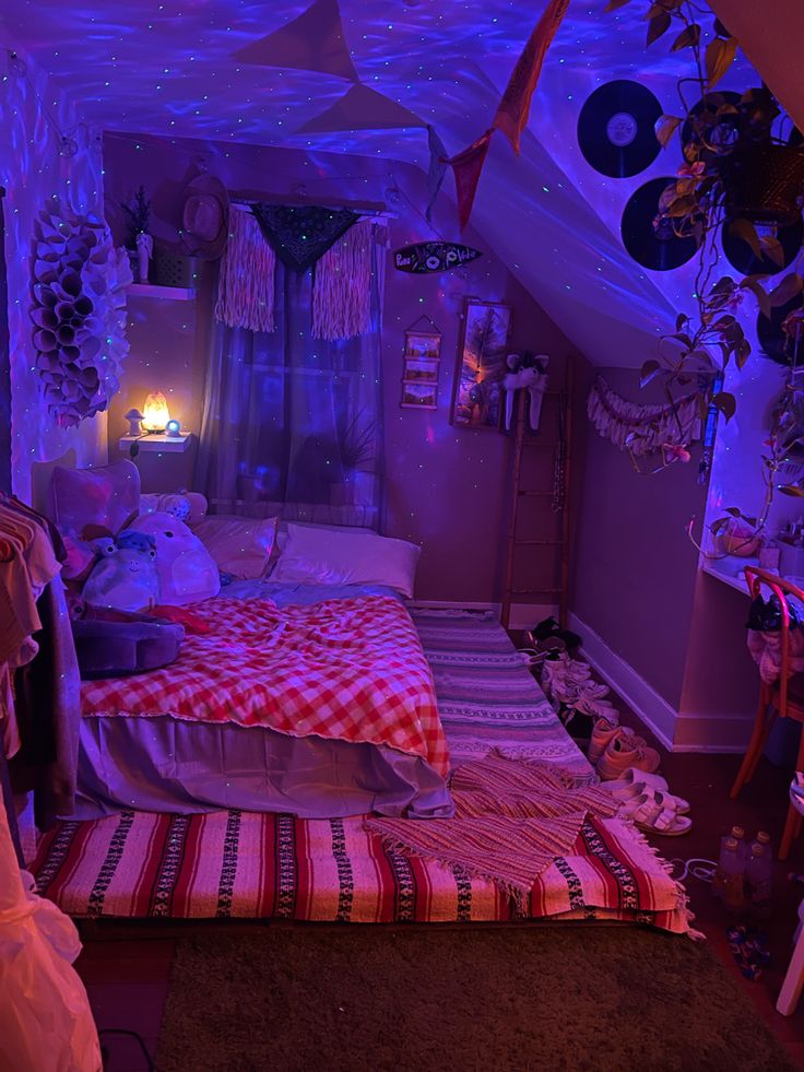 a bed room with a neatly made bed and purple lighting